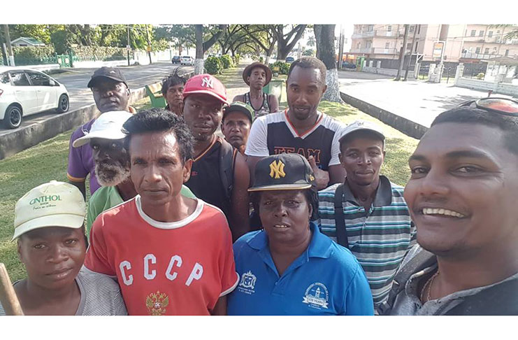 Narine, at left, with staff and volunteers who showed up to work on Sunday