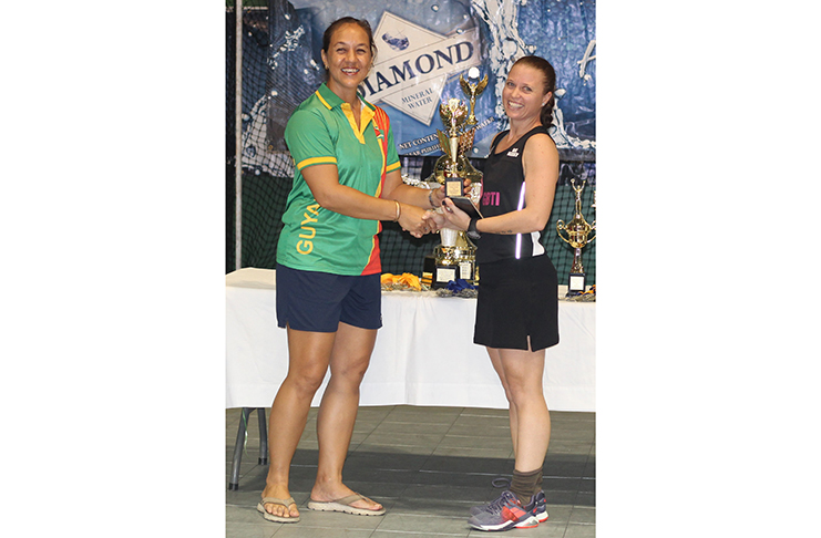 Carina Moller (right) of the GBTI GCC copped the Most Valuable Player award in the female division.