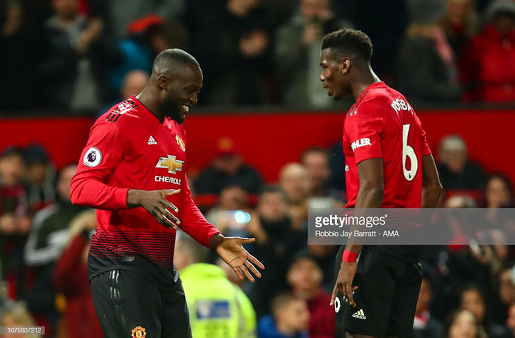 Romelu Lukaku of Manchester United (left) celebrates with Paul Pogba after scoring a goal to make it 4-1 during the Premier League match between Manchester United and AFC Bournemouth at Old Trafford on December 30, 2018 in Manchester, United Kingdom. (Photo by Robbie Jay Barratt - AMA/Getty Images)