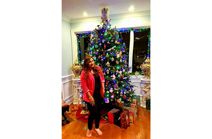 Standing next to the Goonan’s Christmas tree in 2017
