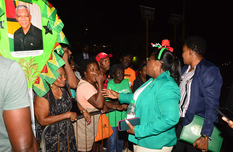 Ministers Simona Broomes and Annette Ferguson speaking to supporters following the passage of the no-confidence motion