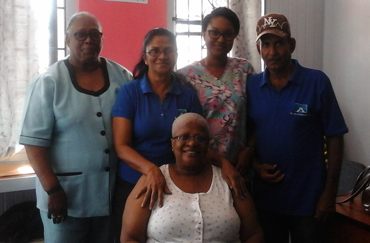 Part of the Beacon Foundation team, (from left) Nurse Marina Ramsden (RN), Nurse Bibi Salim (RN), Nurse Shantille Li-A-Ping, Ms. Janet McKenzie (sitting) and J Ramdial