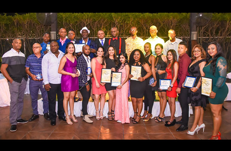 The outstanding employees who were honoured by Ansa McAl at its Annual Staff Social and Awards Ceremony held recently