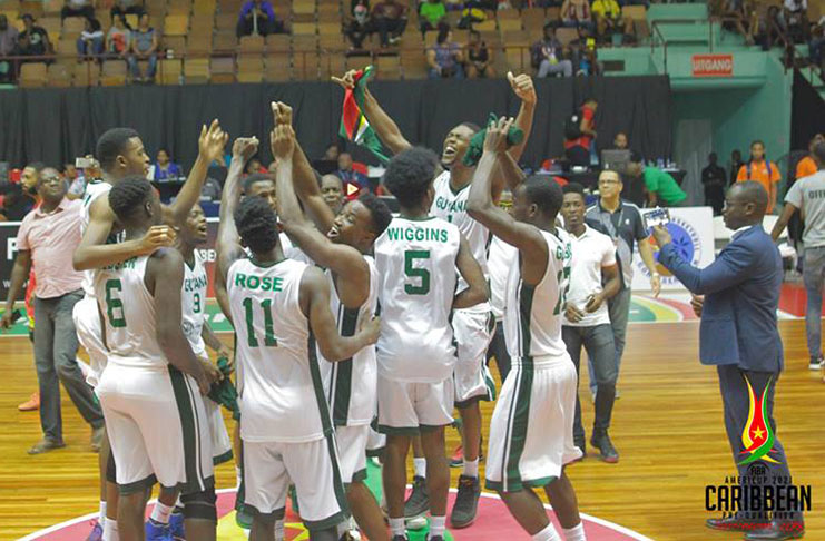 FLASH BACK! The Guyanese players celebrate in Suriname after winning the CBC tournament for the first time.