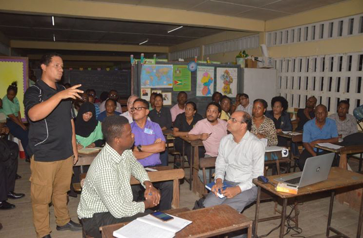 Residents voice their concerns at the New Diamond /Grove Primary School on Thursday (Adrian Narine)