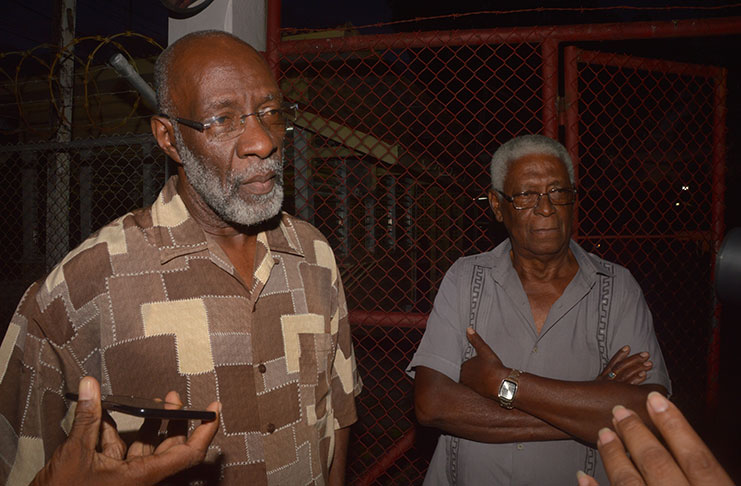 Government-nominated Commissioners Vincent Alexander (left) and Desmond Trotman (Adrian Narine photo)