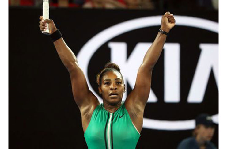 Serena Williams of the U.S. celebrates after winning the match against Romania's Simona Halep. REUTERS/Lucy Nicholson