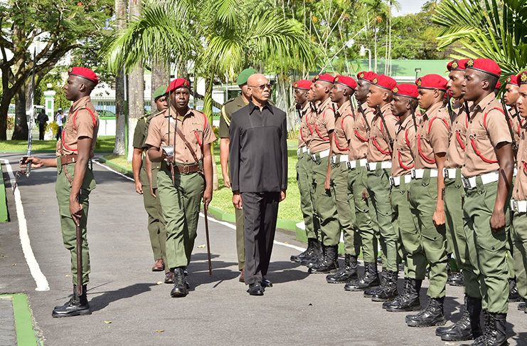 President David Granger inspects a Guard of Honour Thursday morning at the opening of the Guyana Defence Force’s Annual Officers’ Conference, held at the Baridi Benab, State House
