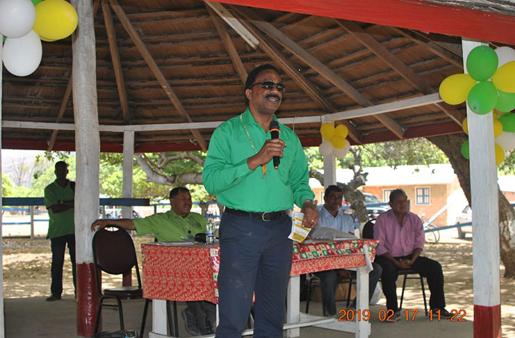 Attorney General Basil Williams speaks at the meeting at Karasabai