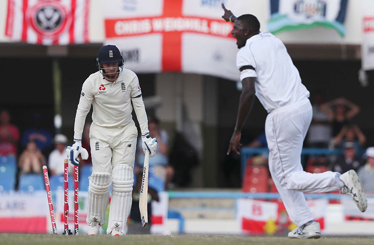 Windies captain Jason Holder disturbs the stumps of Jonny Bairstow on the third day of the second Test.  (AFP photo)