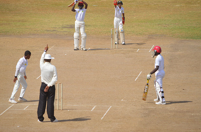 Thaddeus Lovell is given out lbw by Gladwin Henry at the Everest Cricket Club ground. (Adrian Narine photo)