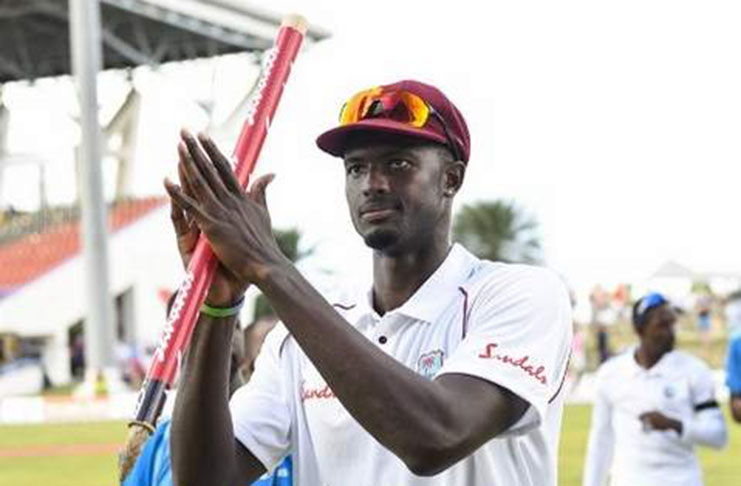 Jason Holder of West Indies celebrates winning on day 3 of the 2nd Test between West Indies and England at Vivian Richards Cricket Stadium in North Sound, Antigua and Barbuda, on February 2, 2019. (Photo:AFP)