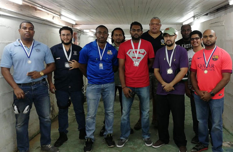 Top performers  of  Guyana NRA Smallbore section display medals
