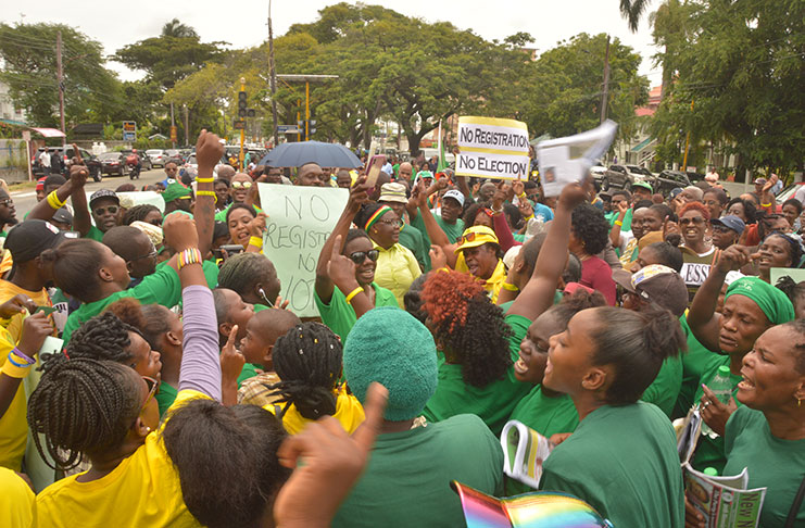 Coalition supporters picketing outside of the
Guyana Elections Commission’s headquarters in
Kingston, Georgetown on Thursday, demanding
fresh house-to-house registration before any
elections (Adrian Narine photo)