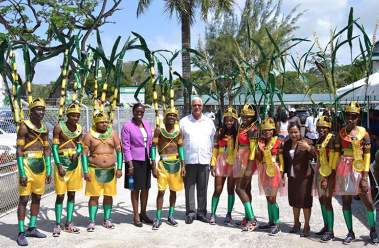 Minister of Agriculture Noel Holder and Permanent Secretary of the Ministry, Delma Nedd, and revellers