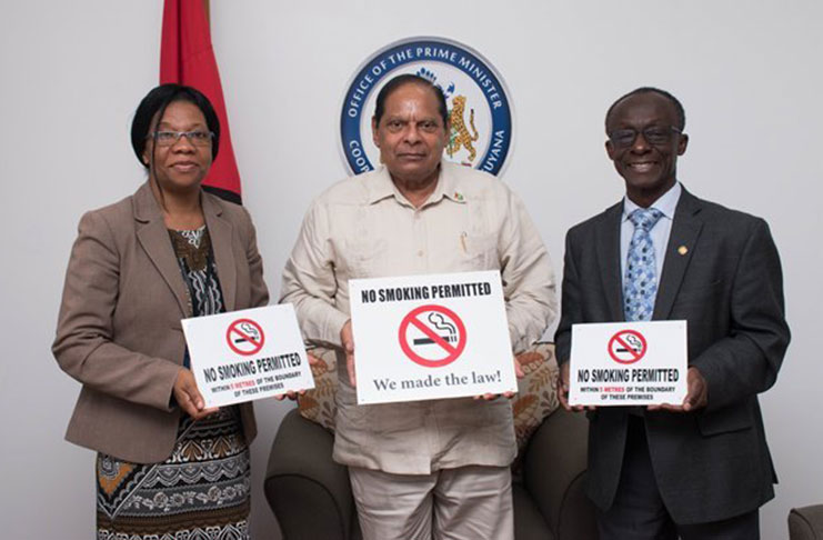 Dr William Adu-Krow poses with Prime Minister Moses V. Nagamootoo and Mrs Karen Roberts from the Non-Communicable Diseases Department of the Ministry of Public Health