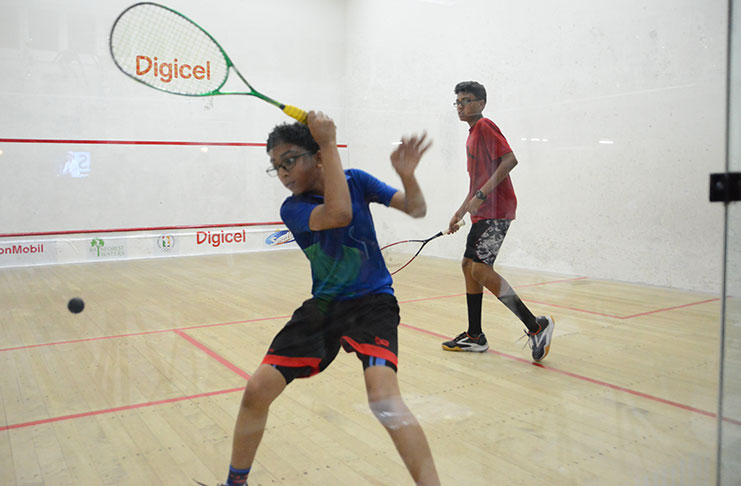 Georgetown Club squash courts were buzzing with energy on Thursday evening. (Samuel Maughn photo)