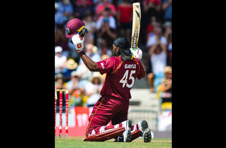 Chris Gayle celebrates after scoring one of his two centuries against England in the just concluded ODI series