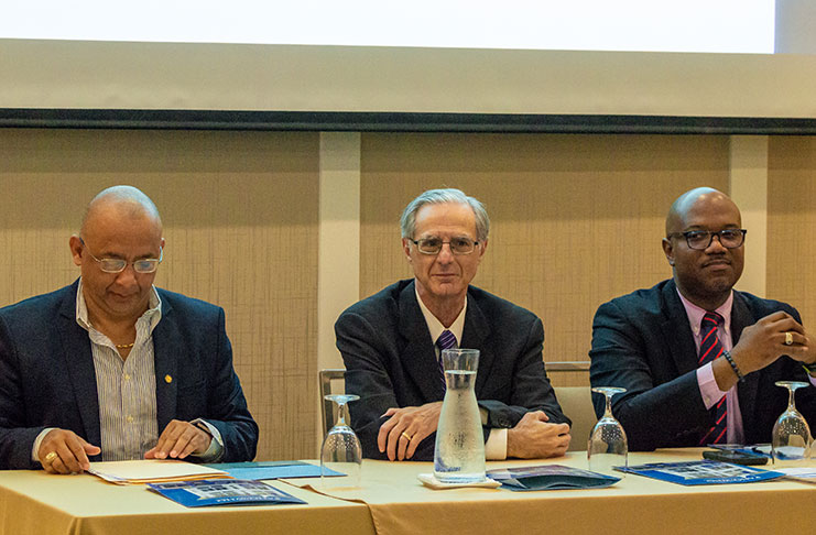 From left are: Specialist, Health System Services at PAHO Paul Edwards, PAHO consultants Donald DiPette from the University of South Carolina and Kenneth Connell from the University of the West Indies.