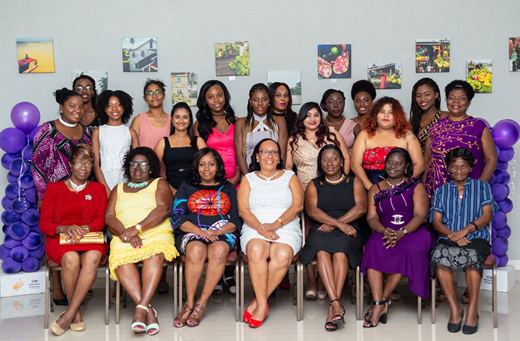Women of the Guyana National Newspaper Limited (GNNL)  Editorial Department at the Evening of Elegance at Roraima Duke Lodge celebrating International Women's Day on Saturday. Among those seated are Director of the Competition and Consumer Affairs Commission, Dawn Holder-Cush (third left) and General Manager (ag) Donna Todd (fourth left) (Delano Williams photo)