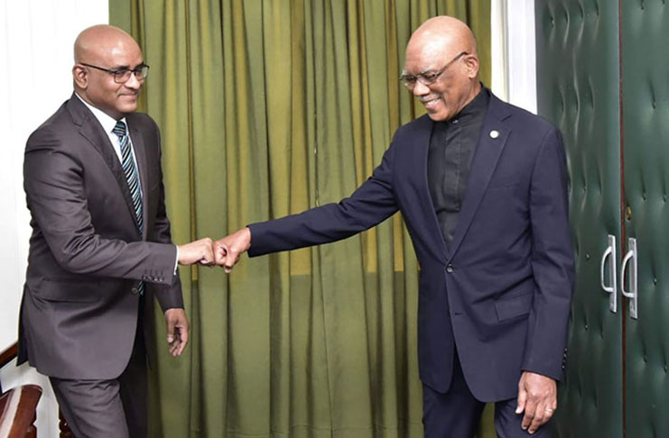 President David Granger meeting with Opposition Leader Bharrat Jagdeo during one of their most recent meeting on the state of the Guyana Elections Commission for the holding of elections.