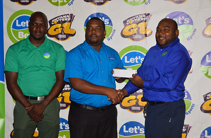 From left, Let’s Bet Sports brand ambassador Rawle Toney, GABA president Adrian Hooper and assistant brand manager Joel Lee at the launch of the GABA/Let’s Bet Sports Divisions 1 & 2 knockout tournaments.