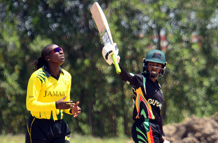 Guyanese captain Shemaine Campbelle acknowledges her teammates after reaching her century.