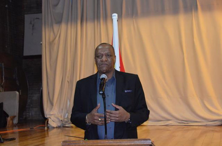 Minister of State, Joseph Harmon addresses members of the Guyanese diaspora Sunday evening at the St. Stephen's Church Hall, New York (Ministry of the Presidency photo)