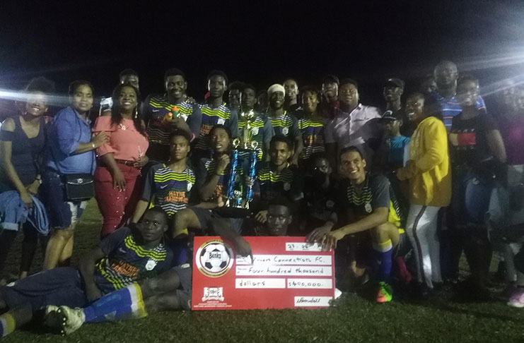 Celebration time for Haynes and Lewis Winners Connection, with Mayor Waneka Arrindell third from right standing