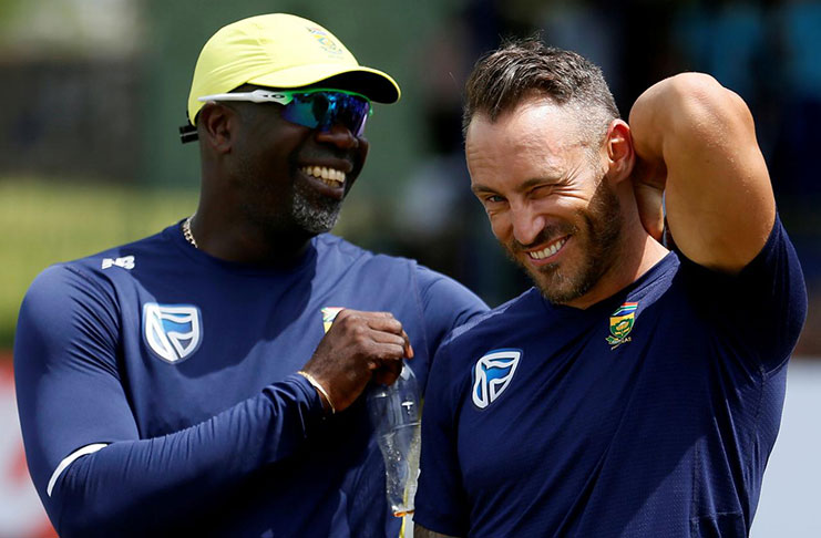 South Africa captain Faf du Plessis (R) reacts next to the team's coach Ottis Gibson after Sri Lanka beat them. (REUTERS/Dinuka Liyanawatte/File photo)
