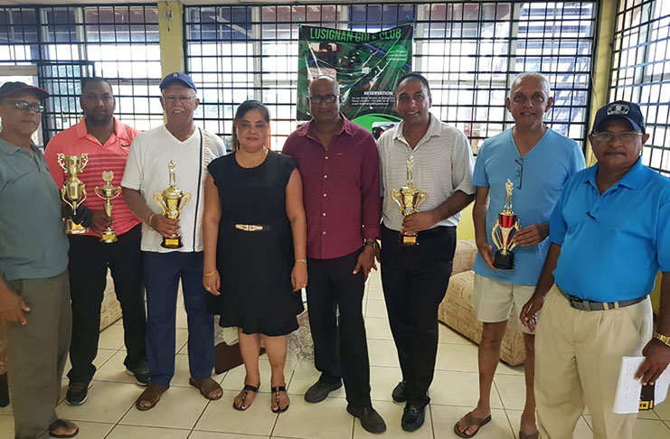 The respective winners strike a pose with the sponsor. From left: Roy Cummings, ‘Max’ Persaud, Clifford Reis, Mrs Ganpat, Mr ‘Curry’ Ganpat, Club President Aleem Hussain, Minister Ronald Bulkan, and Club captain, Chatterpaul Deo.