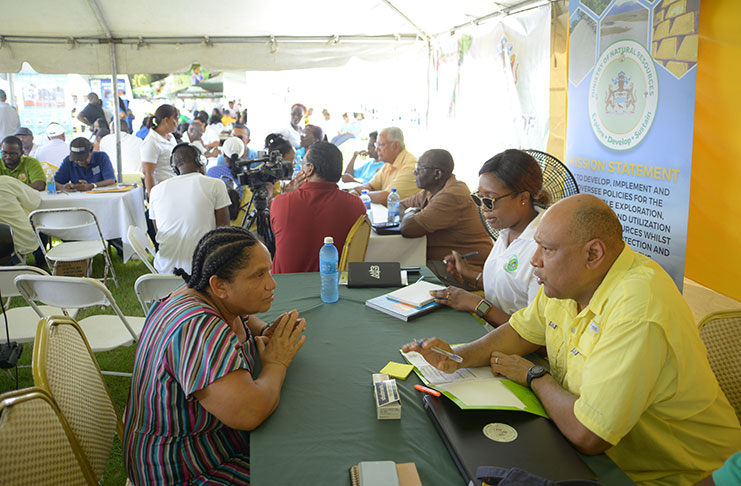 Minister of Natural Resources, Minister Raphael Trotman, interacts with residents (Samuel Maughn photo)