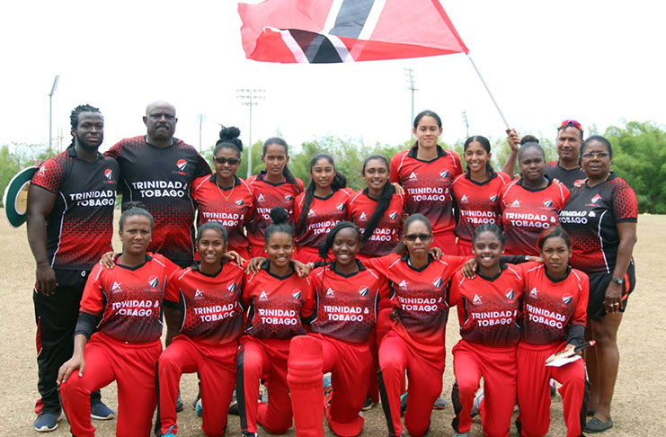 The national women's under-19 team with their coach and technical staff after winning the regional tournament at the National Cricket Centre, Couva, yesterday. PHOTO BY ANSEL JEBODH