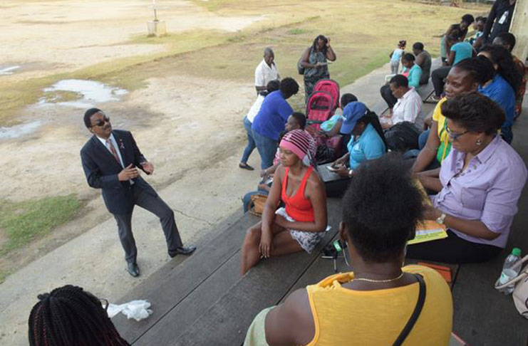 Attorney General and Minister of Legal Affairs, Basil Williams SC. addressing residents
