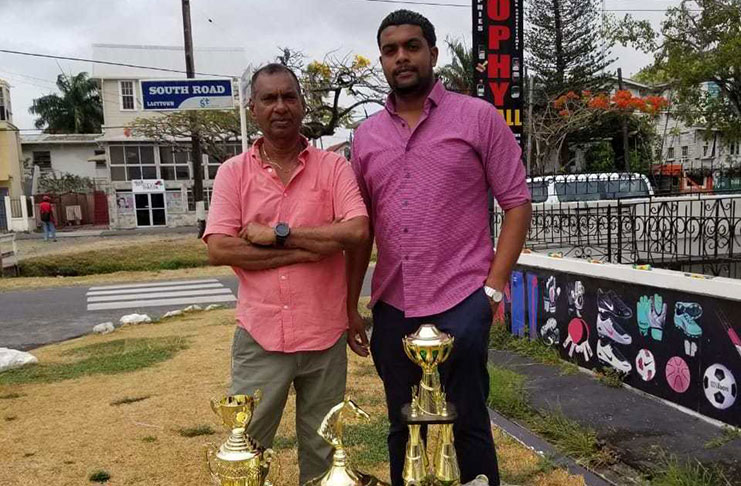Ramesh Sunich (left) stands with Jumbo Jet Thoroughbred Racing Committee’s Nazrudeen Mohamed