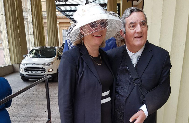 Dr. Brian O’Toole and his wife, Pamela O’Toole outside the Buckingham Palace