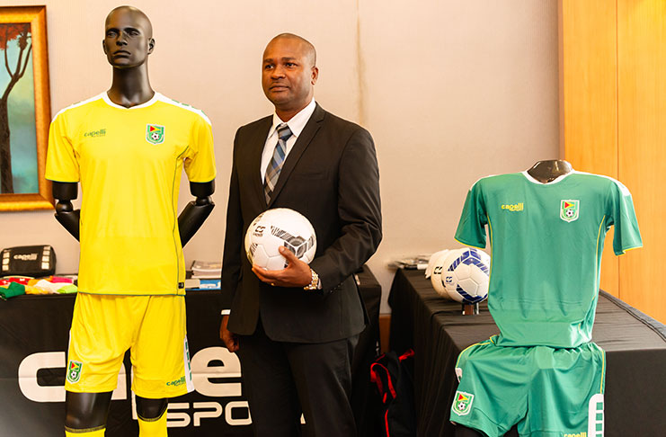 GFF president Wayne Forde shows off the Golden Jaguars’ new kit which will be used during Guyana’s showing at the 2019 CONCACAF Gold Cup. (Samuel Maughn photo)
