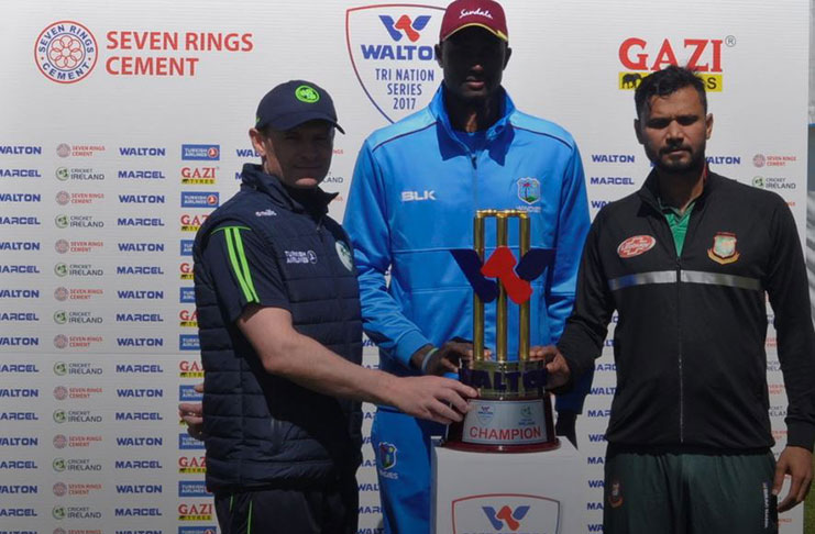 Captains William Porterfield, left, of Ireland and Jason Holder of thew West Indies, centre, and Mashrafe Mortaza (Bangladesh) with the trophy at the official unveiling. Photo credits: CWI Media/Philip Spooner