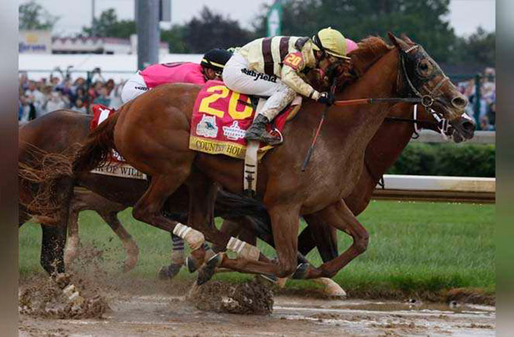 Flavien Prat rides Country House to victory during the 145th running of the Kentucky Derby horse race at Churchill Downs, yesterday, in Louisville, Ky. Luis Saez on Maximum Security finished first but was disqualified.