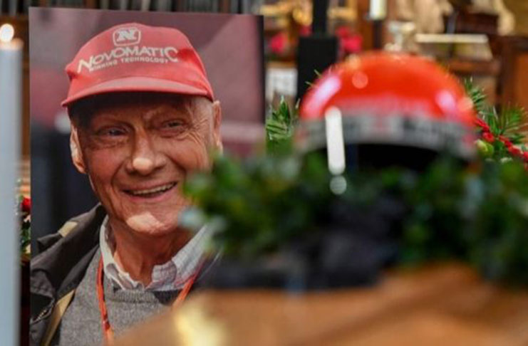 Niki Lauda's crash helmet was put on the driver's coffin. (AFP/Getty Images)