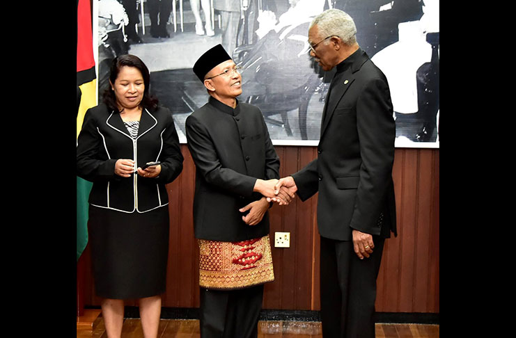 President David Granger; new Ambassador of Indonesia to Guyana, Julang Pujianto and Minister of State, Dawn Hastings-Williams, at the Ministry of the Presidency after the accreditation