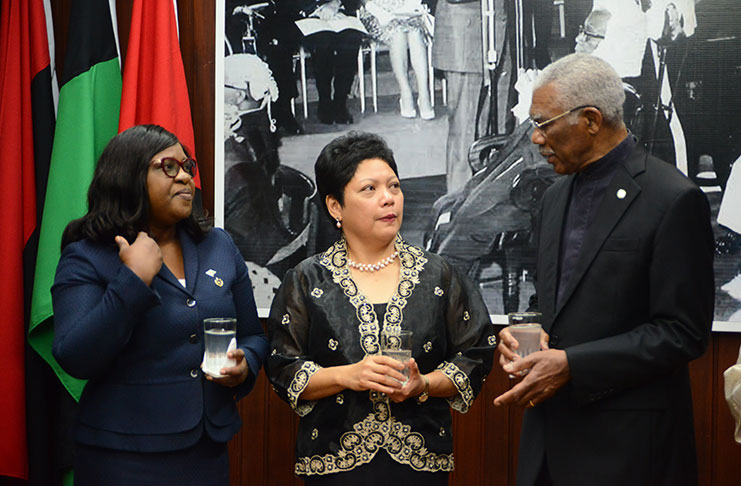 President David Granger in discussion with Ambassador Marichu Mauro and Minister of Foreign Affairs, Dr Karen Cummings after he accepted the letters of credence.