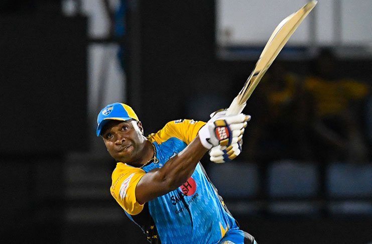In this handout image provided by CPL T20, Kieron Pollard of St Lucia Stars hits 6 during match 15 of the Hero Caribbean Premier League between St Lucia Stars and Guyana Amazon Warriors at the Darren Sammy Cricket Ground on August 24, 2018 in Gros Islet, Saint Lucia. (Photo by Randy Brooks - CPL T20/Getty Images)