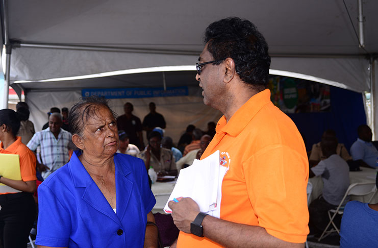 Minister of Public Security Khemraj Ramjattan engaging residents of Essequibo (Samuel Maughn photo)