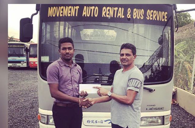 Transcend Entertainment’s Dwight Dodson (left) receives the sponsorship cheque from a representative of Movement Auto Rental & Bus Service.