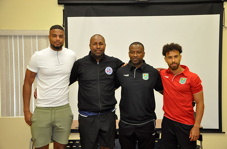 From right: Guyana's captain Sam Cox, head coach Michael Johnson, Bermuda's coach Kyle Lightbourne and captain Dante Leverock.