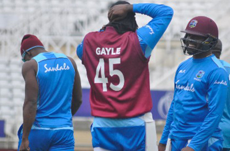 Batsman Darren Bravo (right) chats with Chris Gayle during a training session ahead of today’s clash with Australia at Trent Bridge. (Photo courtesy CWI Media)