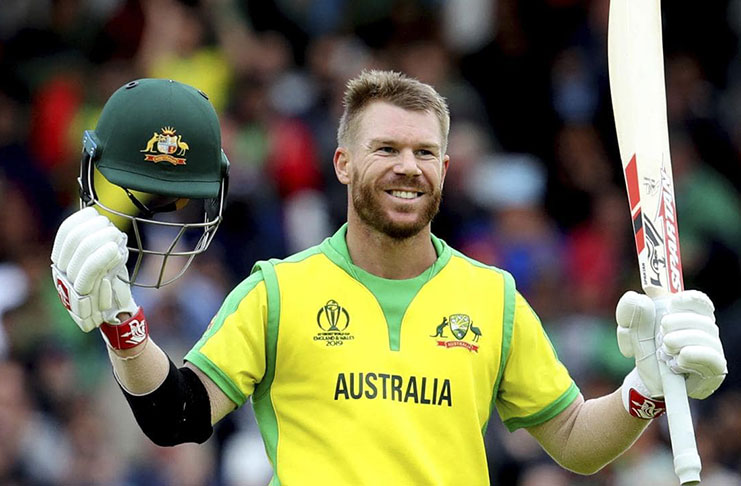 Australia’s David Warner celebrates his century against Bangladesh.