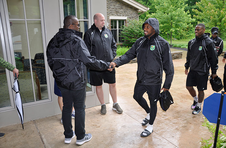 GFF president  Forde greeting the team following their return from a training session.