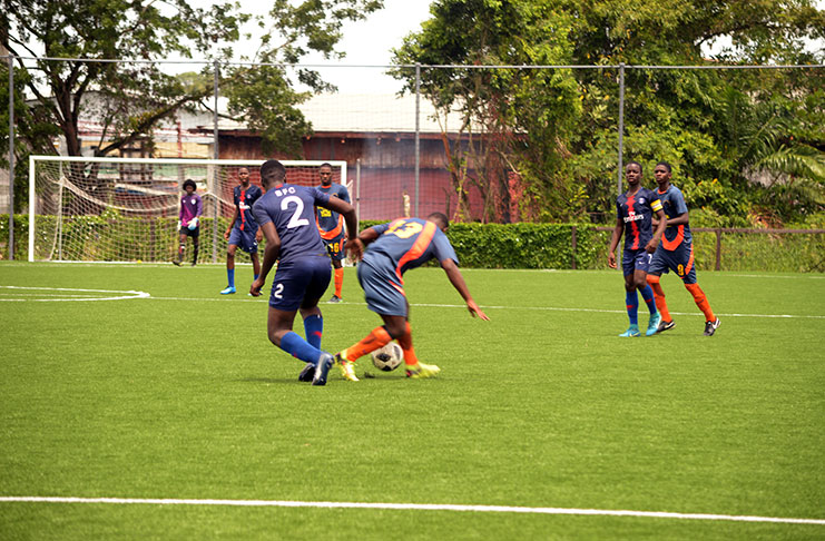 Action in the quarter-final stage of the GFF/KFC U-20 Independence Cup at the GFF National Training Centre, Providence. (Adrian Narine photo)